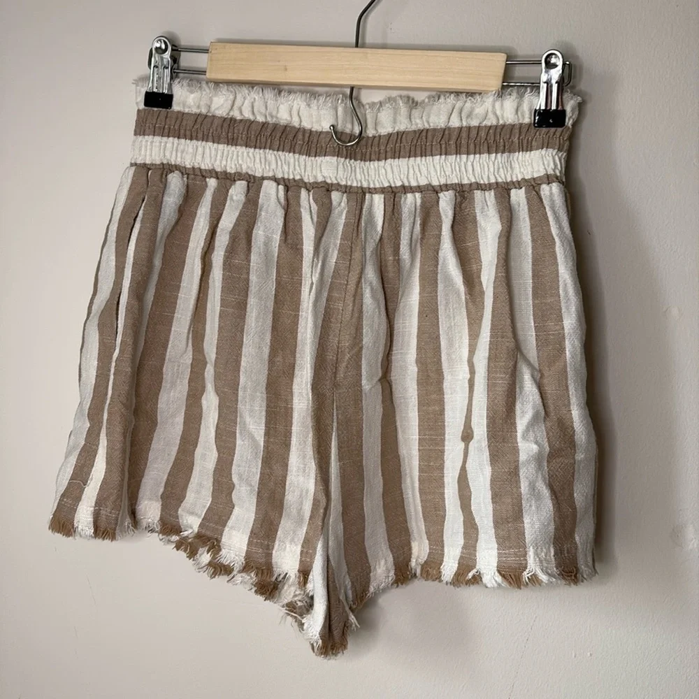 Umgee tans and white boardshorts - Picture 2 of 2